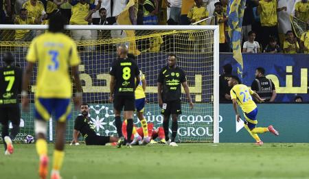 Al‑Ittihad players celebrating stoppage‑time winner Al‑Ittihad players celebrating stoppage‑time winner
